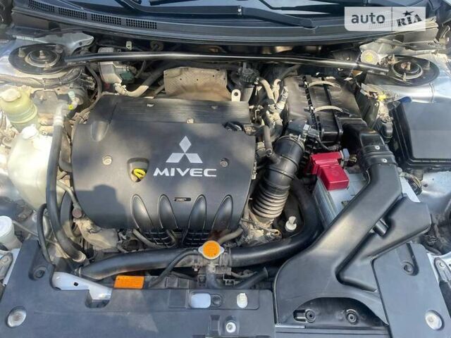 Сірий Міцубісі Lancer, об'ємом двигуна 2 л та пробігом 203 тис. км за 6500 $, фото 10 на Automoto.ua