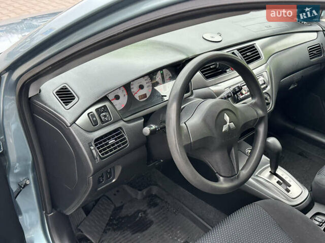Сірий Міцубісі Lancer, об'ємом двигуна 1.6 л та пробігом 116 тис. км за 5199 $, фото 15 на Automoto.ua