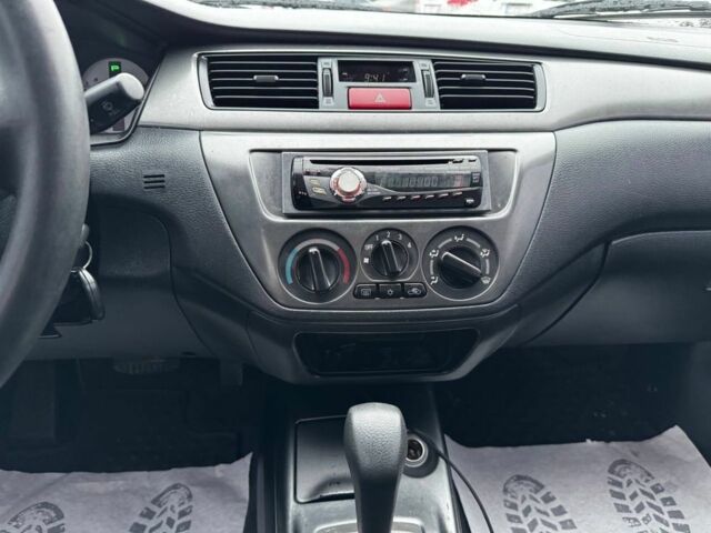 Серый Мицубиси Лансер, объемом двигателя 1.6 л и пробегом 205 тыс. км за 5300 $, фото 8 на Automoto.ua