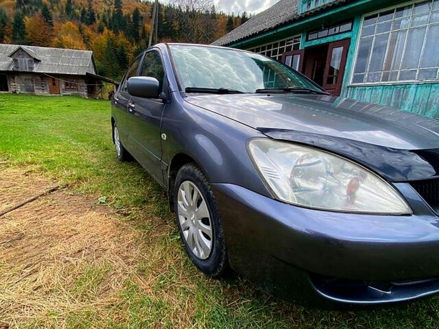 Сірий Міцубісі Lancer, об'ємом двигуна 1.6 л та пробігом 152 тис. км за 4900 $, фото 4 на Automoto.ua