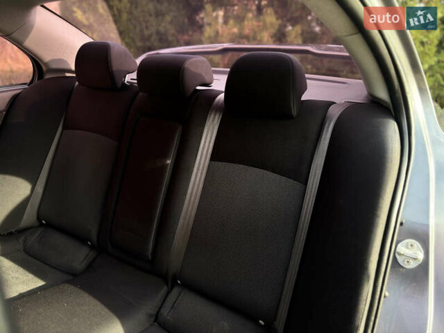 Сірий Міцубісі Lancer, об'ємом двигуна 2 л та пробігом 220 тис. км за 6800 $, фото 21 на Automoto.ua