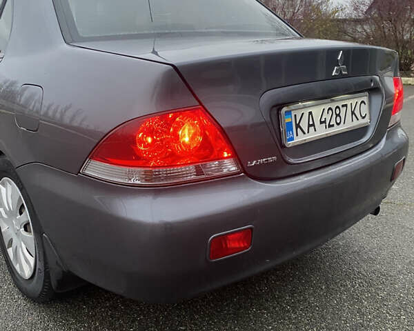 Серый Мицубиси Лансер, объемом двигателя 1.6 л и пробегом 346 тыс. км за 4299 $, фото 15 на Automoto.ua