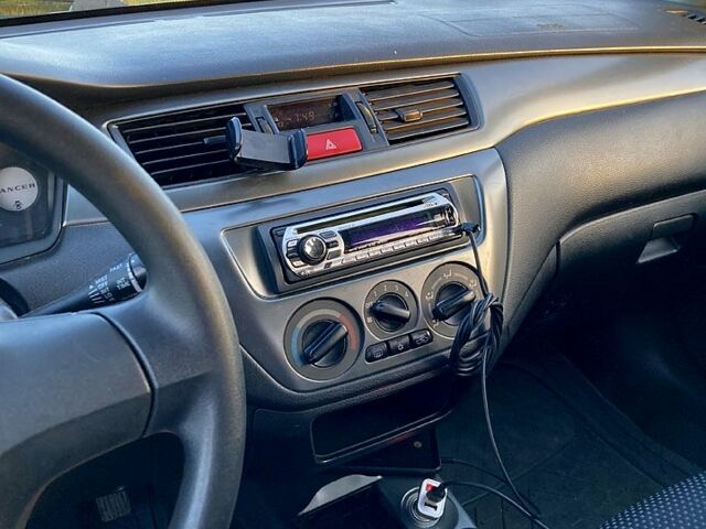 Сірий Міцубісі Lancer, об'ємом двигуна 1.6 л та пробігом 240 тис. км за 4450 $, фото 8 на Automoto.ua