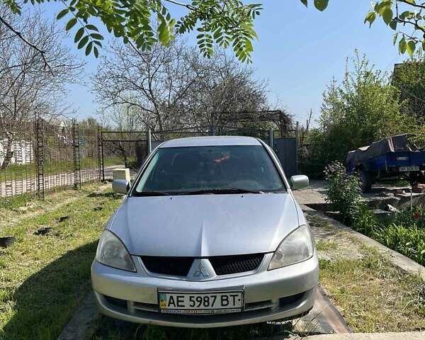Сірий Міцубісі Lancer, об'ємом двигуна 1.6 л та пробігом 274 тис. км за 3700 $, фото 6 на Automoto.ua