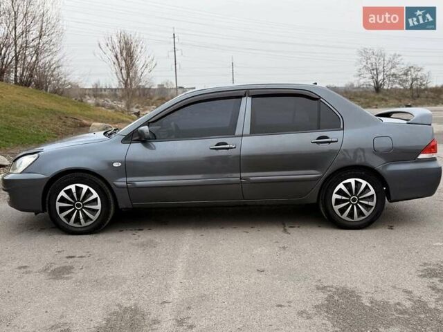 Сірий Міцубісі Lancer, об'ємом двигуна 1.6 л та пробігом 270 тис. км за 4300 $, фото 2 на Automoto.ua
