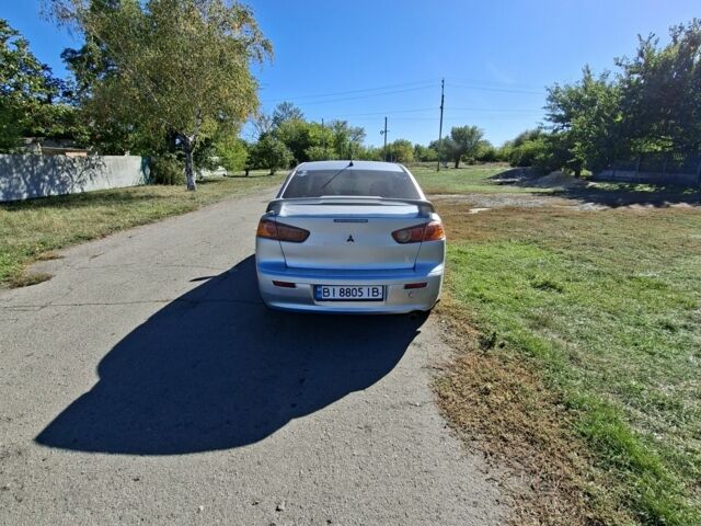 Серый Мицубиси Лансер, объемом двигателя 2 л и пробегом 224 тыс. км за 5500 $, фото 4 на Automoto.ua