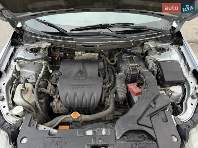 Серый Мицубиси Лансер, объемом двигателя 1.5 л и пробегом 97 тыс. км за 7300 $, фото 27 на Automoto.ua