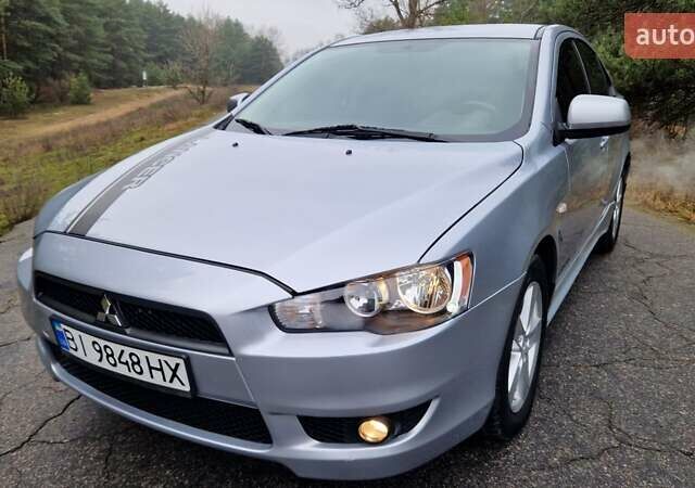 Серый Мицубиси Лансер, объемом двигателя 2 л и пробегом 213 тыс. км за 6550 $, фото 4 на Automoto.ua