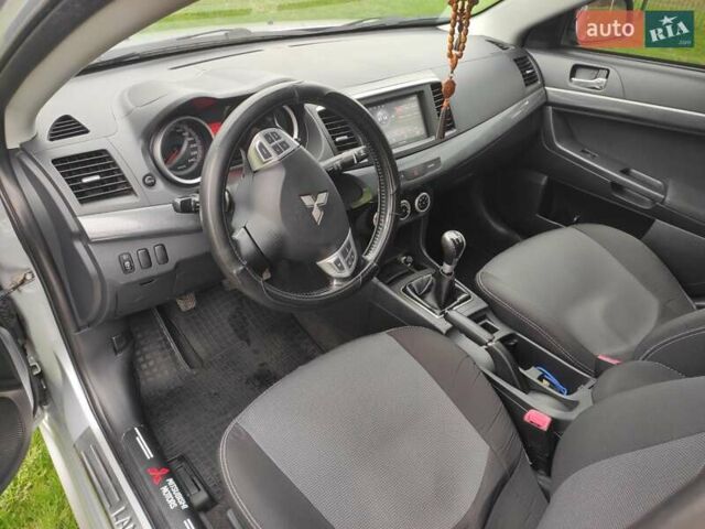 Сірий Міцубісі Lancer, об'ємом двигуна 2 л та пробігом 124 тис. км за 7499 $, фото 13 на Automoto.ua