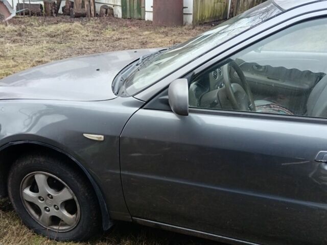 Серый Мицубиси Лансер, объемом двигателя 1.6 л и пробегом 180 тыс. км за 1300 $, фото 3 на Automoto.ua