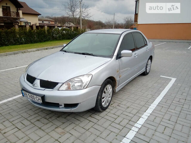 Сірий Міцубісі Lancer, об'ємом двигуна 1.6 л та пробігом 270 тис. км за 3750 $, фото 1 на Automoto.ua