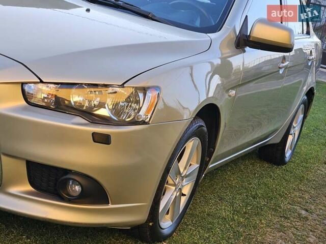 Серый Мицубиси Лансер, объемом двигателя 2 л и пробегом 282 тыс. км за 5450 $, фото 17 на Automoto.ua