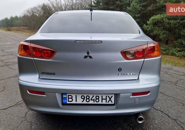Серый Мицубиси Лансер, объемом двигателя 2 л и пробегом 213 тыс. км за 6550 $, фото 8 на Automoto.ua