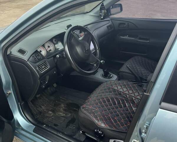 Сірий Міцубісі Lancer, об'ємом двигуна 1.58 л та пробігом 341 тис. км за 4500 $, фото 1 на Automoto.ua
