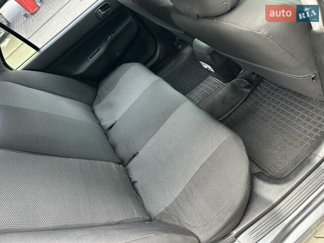 Сірий Міцубісі Lancer, об'ємом двигуна 1.6 л та пробігом 115 тис. км за 2800 $, фото 18 на Automoto.ua