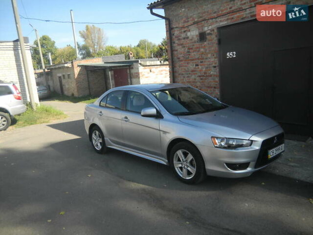 Сірий Міцубісі Lancer, об'ємом двигуна 2 л та пробігом 103 тис. км за 7300 $, фото 33 на Automoto.ua