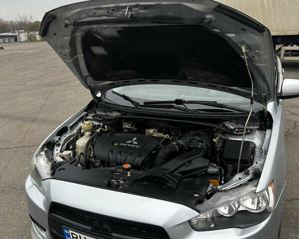 Серый Мицубиси Лансер, объемом двигателя 2 л и пробегом 286 тыс. км за 5800 $, фото 8 на Automoto.ua