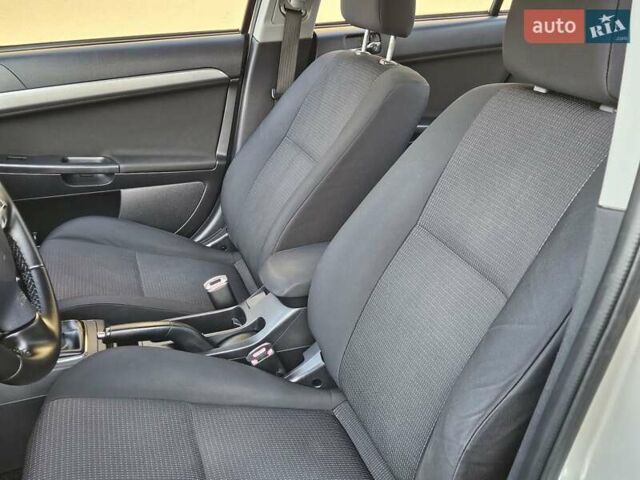 Серый Мицубиси Лансер, объемом двигателя 2 л и пробегом 282 тыс. км за 5450 $, фото 47 на Automoto.ua