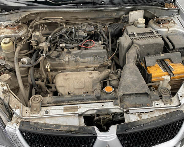 Серый Мицубиси Лансер, объемом двигателя 1.6 л и пробегом 263 тыс. км за 2350 $, фото 13 на Automoto.ua