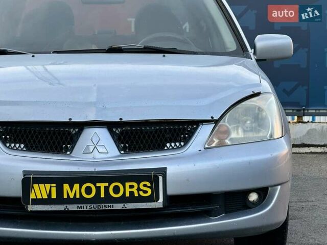 Сірий Міцубісі Lancer, об'ємом двигуна 1.6 л та пробігом 395 тис. км за 4900 $, фото 6 на Automoto.ua