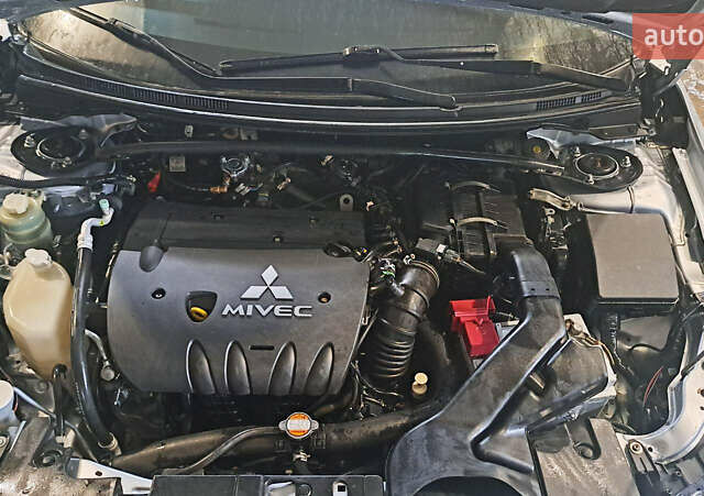 Сірий Міцубісі Lancer, об'ємом двигуна 2 л та пробігом 226 тис. км за 5999 $, фото 6 на Automoto.ua