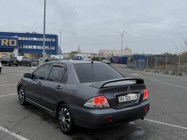 Серый Мицубиси Лансер, объемом двигателя 1.6 л и пробегом 350 тыс. км за 2850 $, фото 7 на Automoto.ua