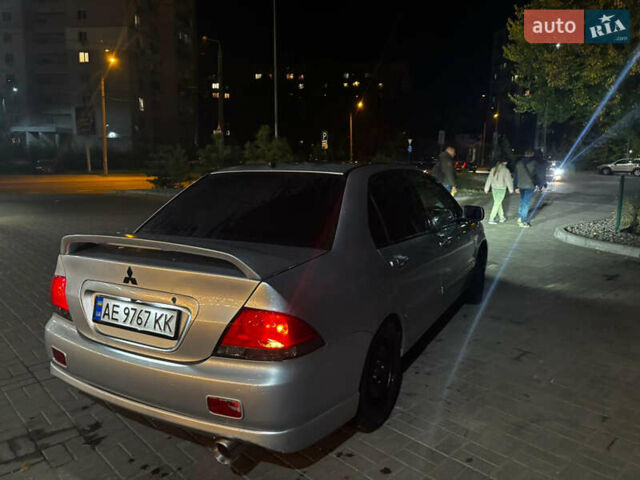 Сірий Міцубісі Lancer, об'ємом двигуна 1.6 л та пробігом 199 тис. км за 4000 $, фото 3 на Automoto.ua