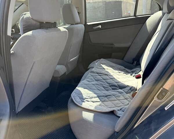 Сірий Міцубісі Lancer, об'ємом двигуна 2 л та пробігом 203 тис. км за 6200 $, фото 11 на Automoto.ua