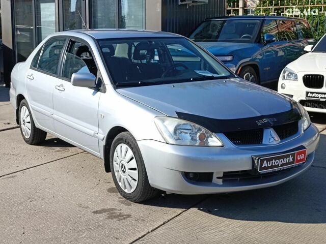 Сірий Міцубісі Lancer, об'ємом двигуна 1.6 л та пробігом 222 тис. км за 3990 $, фото 6 на Automoto.ua