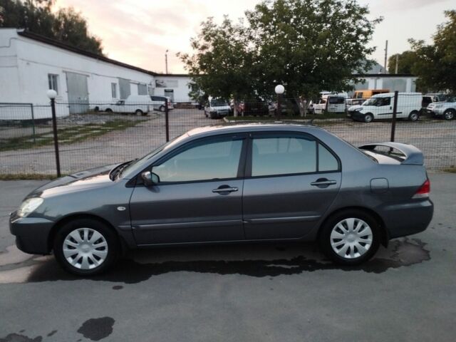 Сірий Міцубісі Lancer, об'ємом двигуна 1.6 л та пробігом 178 тис. км за 5464 $, фото 12 на Automoto.ua