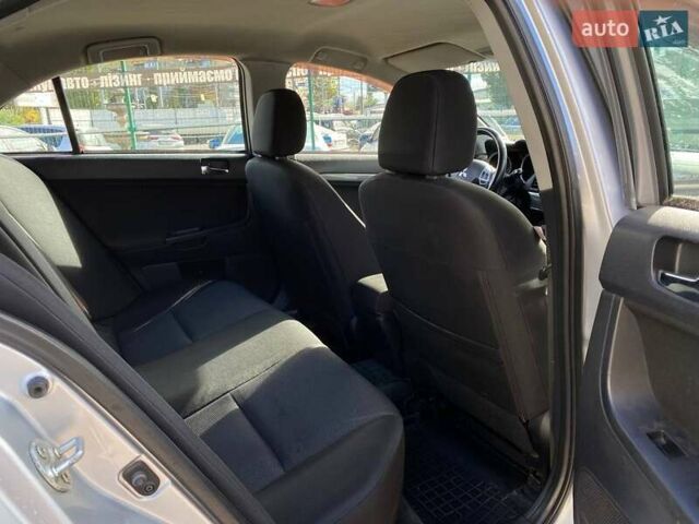 Серый Мицубиси Лансер, объемом двигателя 2 л и пробегом 150 тыс. км за 6100 $, фото 14 на Automoto.ua