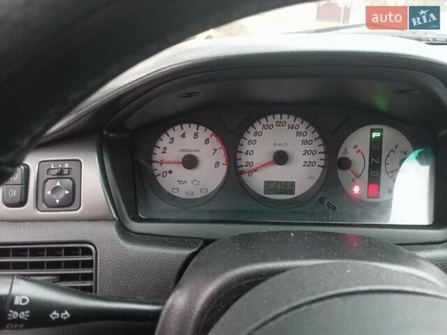Серый Мицубиси Лансер, объемом двигателя 1.6 л и пробегом 175 тыс. км за 4200 $, фото 7 на Automoto.ua