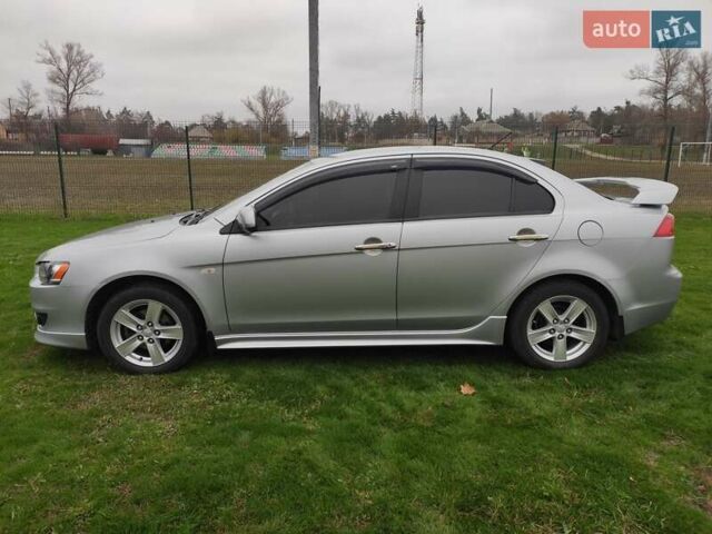 Сірий Міцубісі Lancer, об'ємом двигуна 2 л та пробігом 124 тис. км за 7499 $, фото 4 на Automoto.ua