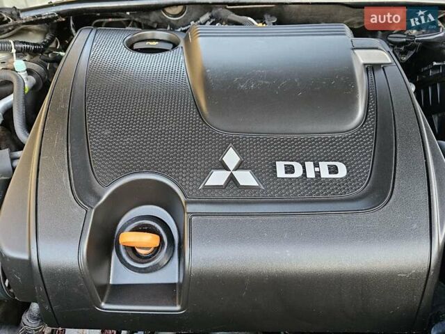 Серый Мицубиси Лансер, объемом двигателя 2 л и пробегом 282 тыс. км за 5450 $, фото 76 на Automoto.ua