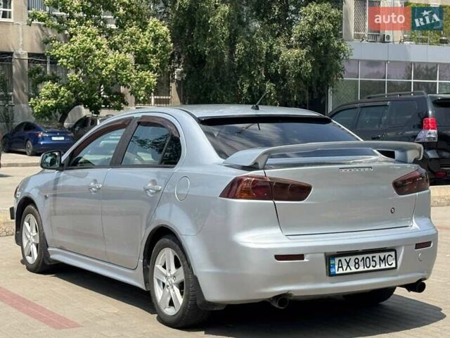 Сірий Міцубісі Lancer, об'ємом двигуна 2 л та пробігом 149 тис. км за 6798 $, фото 3 на Automoto.ua