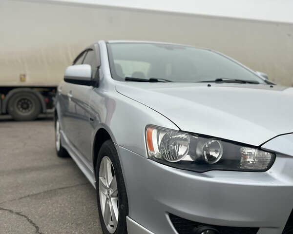 Серый Мицубиси Лансер, объемом двигателя 2 л и пробегом 286 тыс. км за 5800 $, фото 5 на Automoto.ua