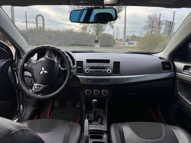 Серый Мицубиси Лансер, объемом двигателя 2 л и пробегом 207 тыс. км за 5800 $, фото 15 на Automoto.ua