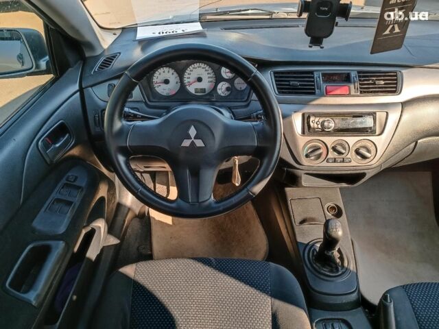 Сірий Міцубісі Lancer, об'ємом двигуна 1.6 л та пробігом 222 тис. км за 3990 $, фото 24 на Automoto.ua