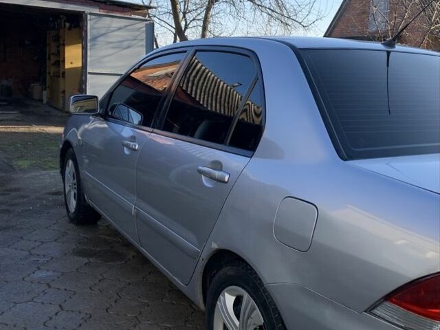 Сірий Міцубісі Lancer, об'ємом двигуна 1.6 л та пробігом 248 тис. км за 3000 $, фото 5 на Automoto.ua