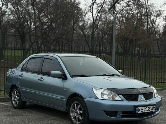 Серый Мицубиси Лансер, объемом двигателя 1.6 л и пробегом 238 тыс. км за 4300 $, фото 20 на Automoto.ua