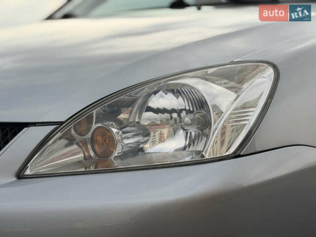 Серый Мицубиси Лансер, объемом двигателя 1.3 л и пробегом 160 тыс. км за 5555 $, фото 26 на Automoto.ua