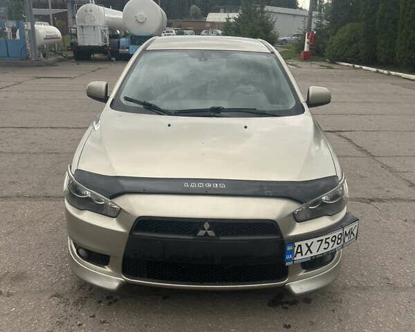 Серый Мицубиси Лансер, объемом двигателя 2 л и пробегом 227 тыс. км за 5850 $, фото 1 на Automoto.ua