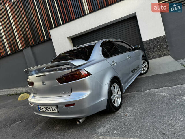Сірий Міцубісі Lancer, об'ємом двигуна 2 л та пробігом 173 тис. км за 6800 $, фото 11 на Automoto.ua