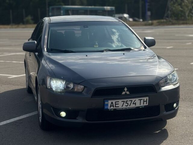 Сірий Міцубісі Lancer, об'ємом двигуна 2 л та пробігом 220 тис. км за 6600 $, фото 1 на Automoto.ua