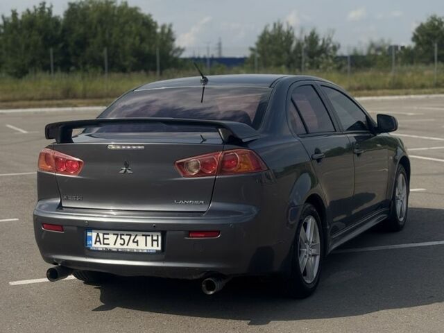 Сірий Міцубісі Lancer, об'ємом двигуна 2 л та пробігом 220 тис. км за 6600 $, фото 4 на Automoto.ua