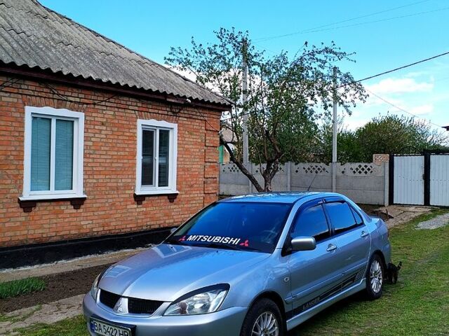 Сірий Міцубісі Lancer, об'ємом двигуна 1.6 л та пробігом 280 тис. км за 4800 $, фото 2 на Automoto.ua