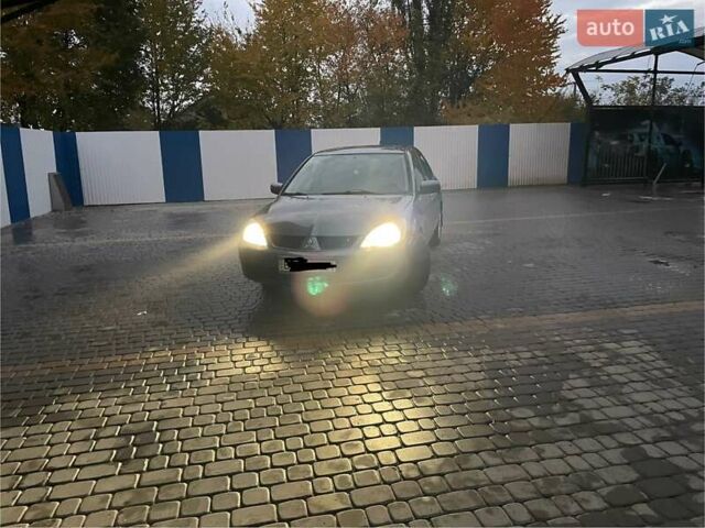 Сірий Міцубісі Lancer, об'ємом двигуна 1.6 л та пробігом 330 тис. км за 3500 $, фото 26 на Automoto.ua