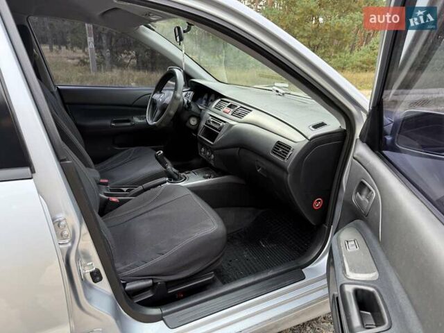 Серый Мицубиси Лансер, объемом двигателя 1.6 л и пробегом 200 тыс. км за 4400 $, фото 18 на Automoto.ua