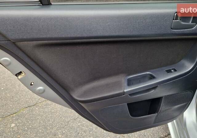 Серый Мицубиси Лансер, объемом двигателя 2 л и пробегом 213 тыс. км за 6550 $, фото 14 на Automoto.ua