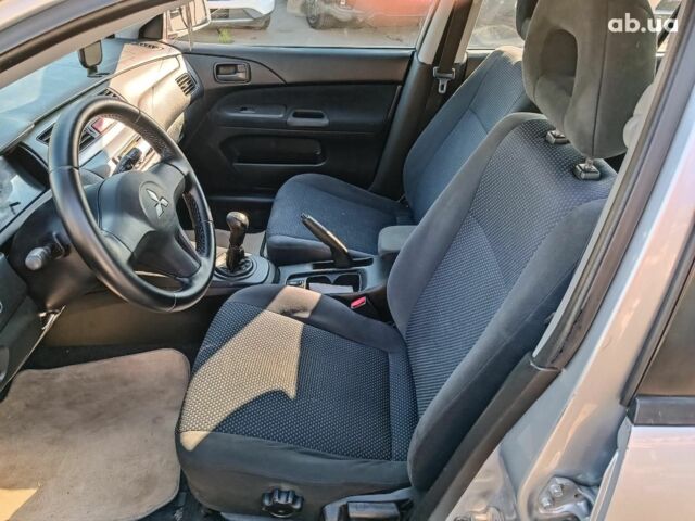 Сірий Міцубісі Lancer, об'ємом двигуна 1.6 л та пробігом 222 тис. км за 3990 $, фото 16 на Automoto.ua